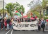 People holding banners of Ceasefire now